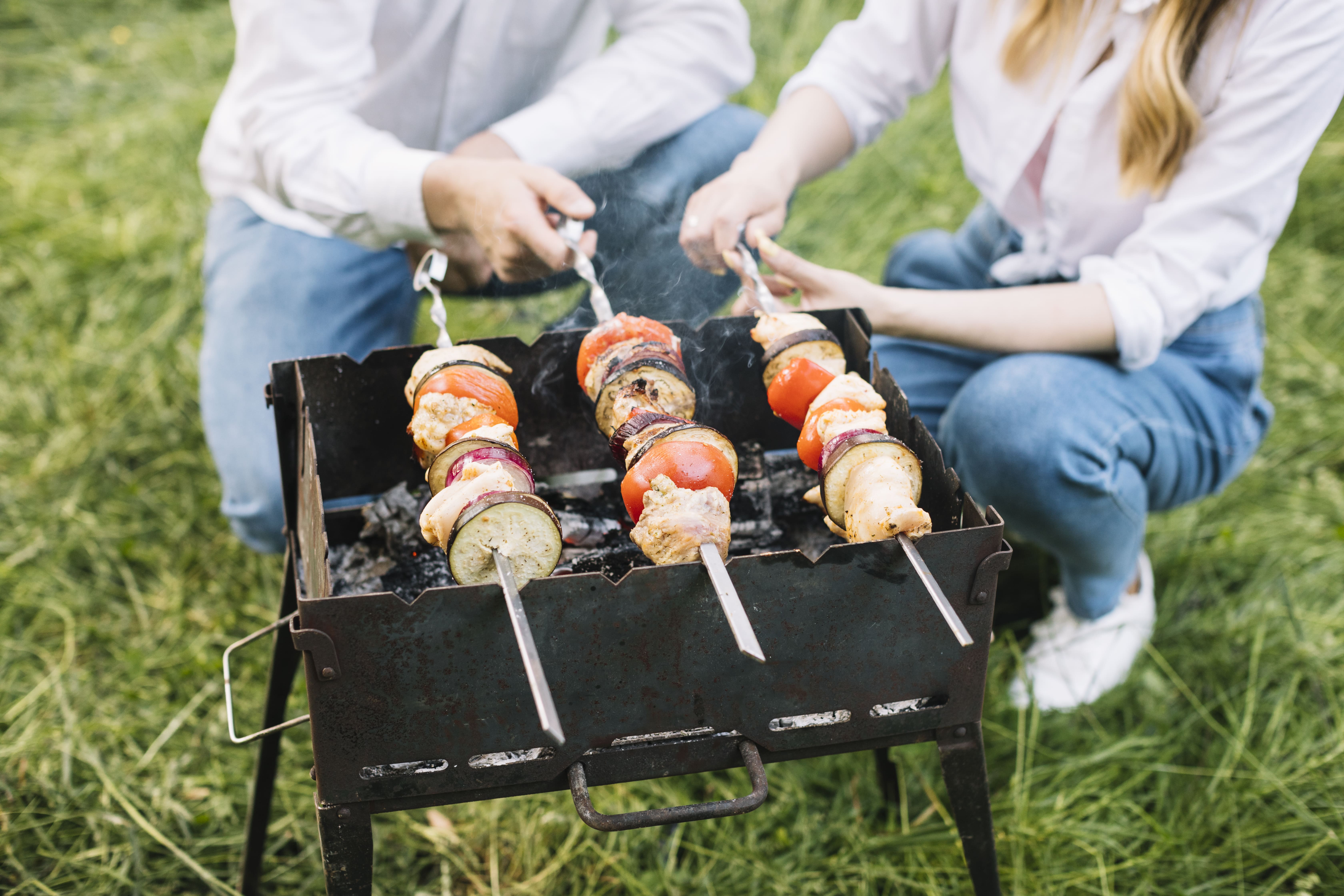couple-doing-barbecue-nature (2).jpg